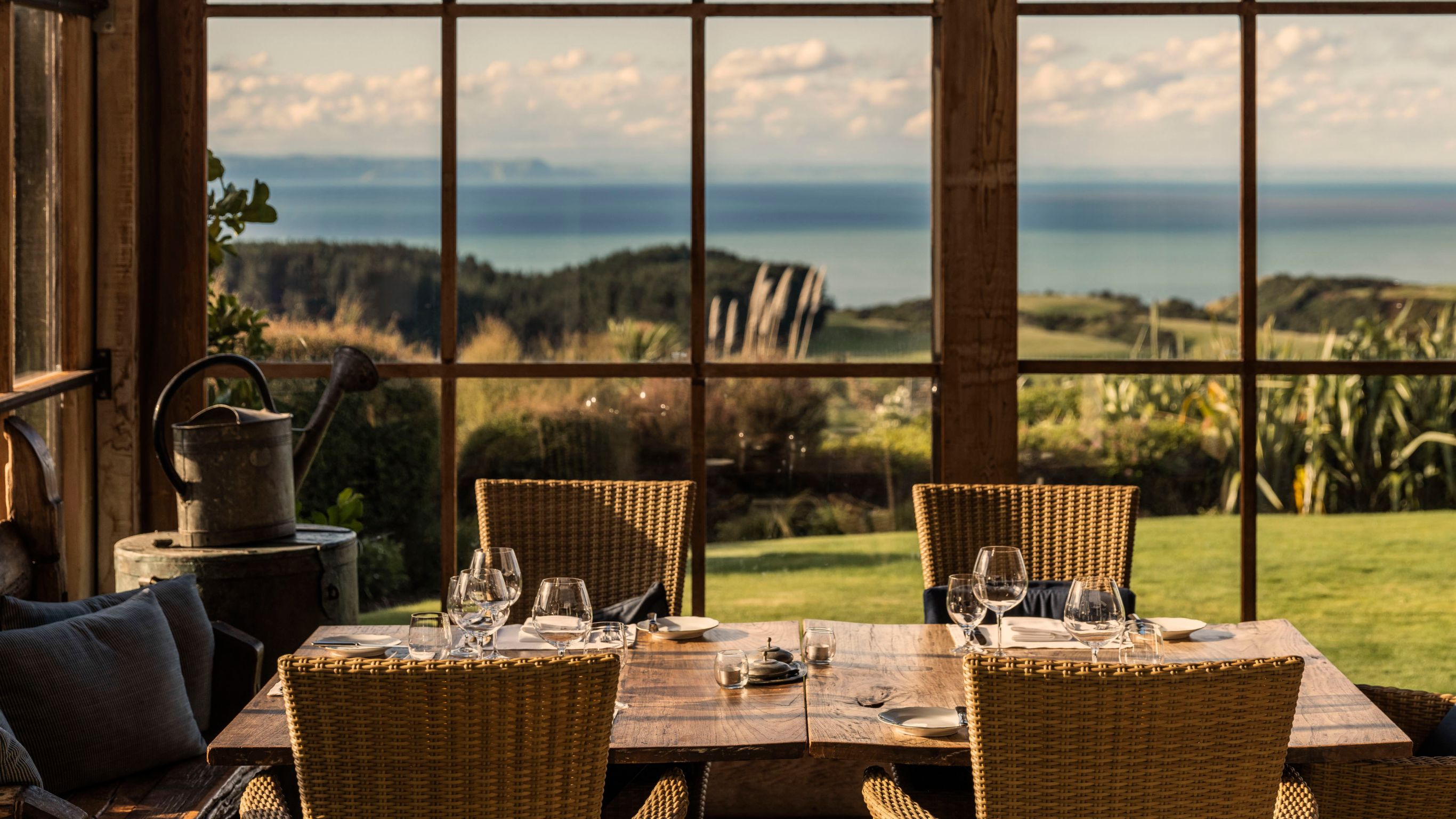 Interior view of loggia dining room looking out window to view beyond